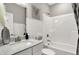 Clean bathroom with white subway tile and bathtub shower combo at 20259 Chad Hittle Blvd, Westfield, IN 46074