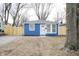 Newly renovated blue house with a fenced yard at 2217 E 34Th St, Indianapolis, IN 46218