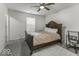 Bright bedroom with a queen bed and desk at 2539 Shadowbrook Trce, Greenwood, IN 46143