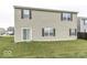 Two-story house exterior showcasing a sliding glass door and multiple windows at 2539 Shadowbrook Trce, Greenwood, IN 46143