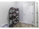 Neat hallway with shoe storage and an interior door at 2539 Shadowbrook Trce, Greenwood, IN 46143