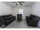 Relaxing living room with two black leather recliners at 2539 Shadowbrook Trce, Greenwood, IN 46143