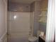 Clean bathroom with a tub, shower, and toilet at 317 N Bradley Ave, Indianapolis, IN 46201