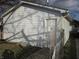 Detached single car garage with a pedestrian door at 317 N Bradley Ave, Indianapolis, IN 46201