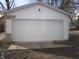 Single car garage with an overhead door at 317 N Bradley Ave, Indianapolis, IN 46201