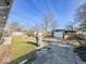 Spacious backyard with detached garage and concrete pad at 3309 N Riley Ave, Indianapolis, IN 46218