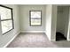 Spacious bedroom with neutral walls and new carpeting at 3563 Carrollton Ave, Indianapolis, IN 46205