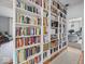 Built-in bookcases filled with books line the hallway at 3677 E 600 N, Shelbyville, IN 46176