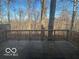 Wooden deck overlooking a wooded area at 4213 Woodsage Trce, Indianapolis, IN 46237