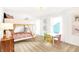 Playful bedroom with bunk beds, colorful chairs, and animal art at 4328 Chital Pl, Greenwood, IN 46143