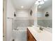 Elegant bathroom featuring a soaking tub and modern vanity at 5101 W Quincy Ct, Columbus, IN 47203