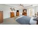 Comfortable bedroom with a queen-size bed and plenty of closet space at 5101 W Quincy Ct, Columbus, IN 47203