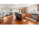 Bright kitchen boasts hardwood floors, an island, and stainless steel appliances at 5101 W Quincy Ct, Columbus, IN 47203