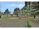 Spacious backyard with mature trees and landscaping at 5360 N Carroll Rd, Indianapolis, IN 46235