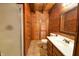 Charming bathroom with wood walls, a shower, and a vanity at 5360 N Carroll Rd, Indianapolis, IN 46235