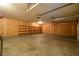 Attached garage with shelving and overhead door at 5360 N Carroll Rd, Indianapolis, IN 46235