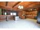 Kitchen features wood cabinets, black appliances and tile flooring at 5360 N Carroll Rd, Indianapolis, IN 46235
