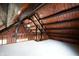 Open loft area with wood beams and ceiling at 5360 N Carroll Rd, Indianapolis, IN 46235