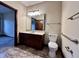 Bathroom with accessible features and a large mirror at 5375 E Commons West Dr, Mooresville, IN 46158