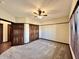 Spacious bedroom with carpeted floors and ceiling fan at 5375 E Commons West Dr, Mooresville, IN 46158