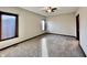 Bright bedroom with carpet, ceiling fan and large window at 5375 E Commons West Dr, Mooresville, IN 46158
