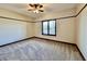 Well-lit bedroom featuring carpet and a ceiling fan at 5375 E Commons West Dr, Mooresville, IN 46158