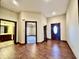 Elegant entryway with hardwood floors and views to other rooms at 5375 E Commons West Dr, Mooresville, IN 46158