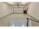 Attached garage with epoxy flooring and ample storage at 5375 E Commons West Dr, Mooresville, IN 46158