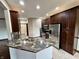 Modern kitchen with stainless steel appliances and granite countertops at 5375 E Commons West Dr, Mooresville, IN 46158