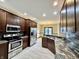 Modern kitchen with stainless steel appliances and granite countertops at 5375 E Commons West Dr, Mooresville, IN 46158