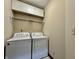 Laundry room with washer, dryer, and overhead cabinets at 5375 E Commons West Dr, Mooresville, IN 46158