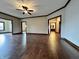 Spacious living room with hardwood floors and ceiling fan at 5375 E Commons West Dr, Mooresville, IN 46158