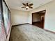 Bright office features hardwood floors and ceiling fan at 5375 E Commons West Dr, Mooresville, IN 46158