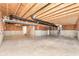 Unfinished basement with exposed beams and plumbing at 6927 Park Grove Blvd, Whitestown, IN 46075