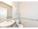 Clean bathroom with pedestal sink and gray mosaic accents at 6927 Park Grove Blvd, Whitestown, IN 46075