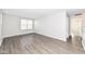 Bright bedroom with gray carpet and access to hallway at 6927 Park Grove Blvd, Whitestown, IN 46075