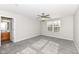 Primary bedroom with ceiling fan and gray carpet at 6927 Park Grove Blvd, Whitestown, IN 46075