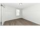 Light-filled bedroom featuring wood-look floors and window at 6927 Park Grove Blvd, Whitestown, IN 46075