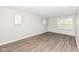 Spacious bedroom with gray carpet and large window at 6927 Park Grove Blvd, Whitestown, IN 46075