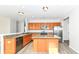 Modern kitchen featuring stainless steel appliances and wood cabinetry at 6927 Park Grove Blvd, Whitestown, IN 46075