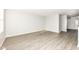 Bright living room with wood-look floors and neutral walls at 6927 Park Grove Blvd, Whitestown, IN 46075