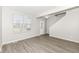 Spacious living room with hardwood floors and large window at 6927 Park Grove Blvd, Whitestown, IN 46075