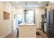 Modern kitchen with stainless steel appliances and an island at 743 Bates St, Indianapolis, IN 46202