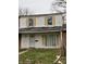 Two-story house with yellow shutters and a small front yard at 8434 Meadowlark Dr, Indianapolis, IN 46226