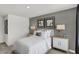 Bright bedroom with gray walls and white bedding at 8934 Lowell St, McCordsville, IN 46055