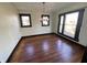 Bright dining room with hardwood floors and a chandelier at 102 N Munsie St, Indianapolis, IN 46229