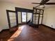 Hardwood floors and staircase access from living room at 102 N Munsie St, Indianapolis, IN 46229