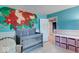 Bedroom with floral wall art, crib, and storage at 11064 Oakridge Dr, Fishers, IN 46038