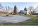 Rear view of house showing patio and expansive backyard at 1128 Palo Vista Rd, Greenwood, IN 46143