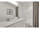 Shared bathroom with double vanity, tub, and shower at 11907 Aubrey Ln, Fishers, IN 46040